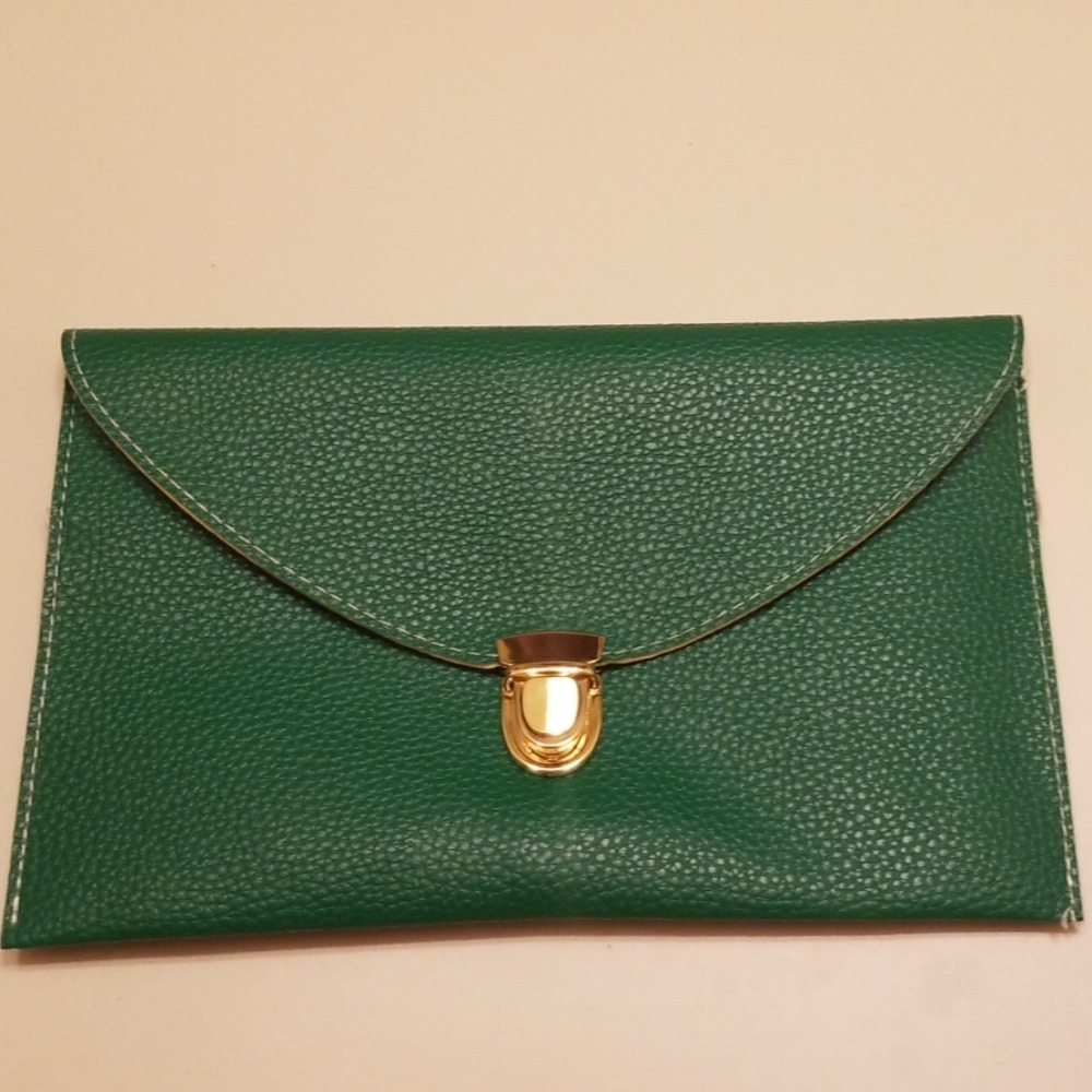 Beautiful Green clutch purse with gold chain.